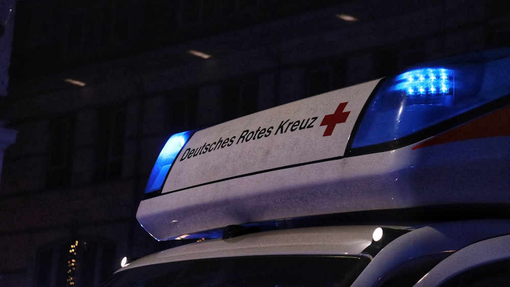 a police car parked in front of a building