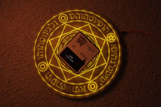 A glowing phone handset surrounded by mystical light, symbolizing secure calls.