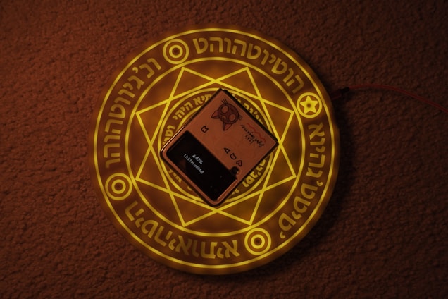 A warm, inviting phone with mystical symbols glowing softly around it.