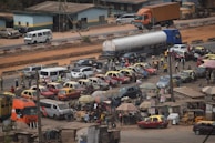 An image showcasing road transportation with trucks delivering goods.