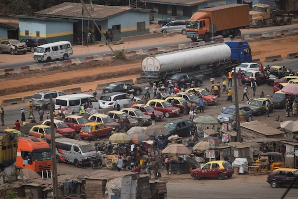 An image of a busy street with Badiah Logistics vehicles making deliveries.