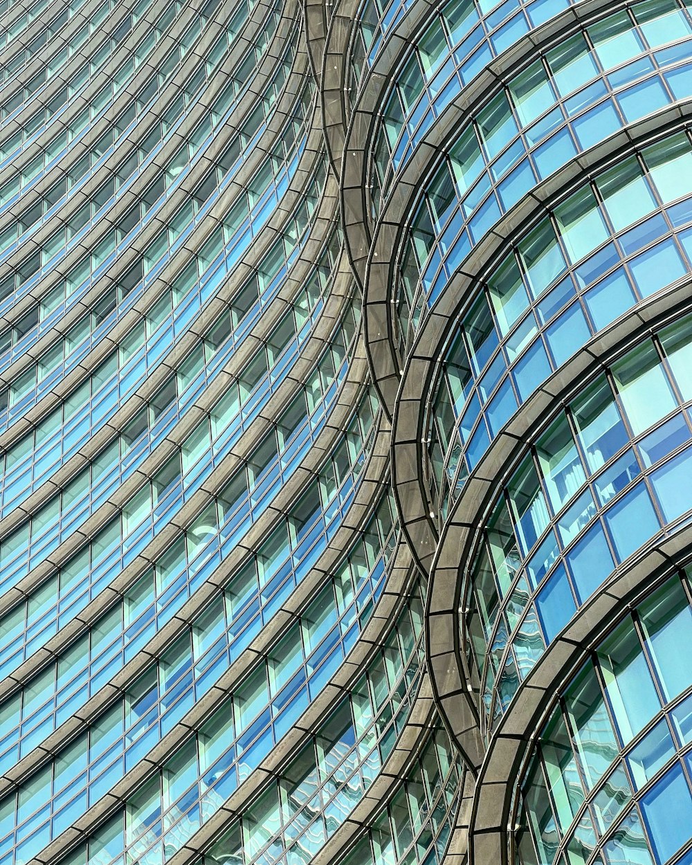 a large building with many windows and a clock