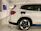 Technician installing an electric vehicle charger in a residential garage