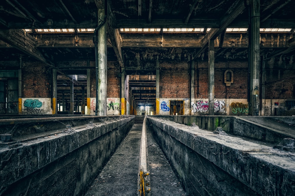 a large long train on a train track at a train station