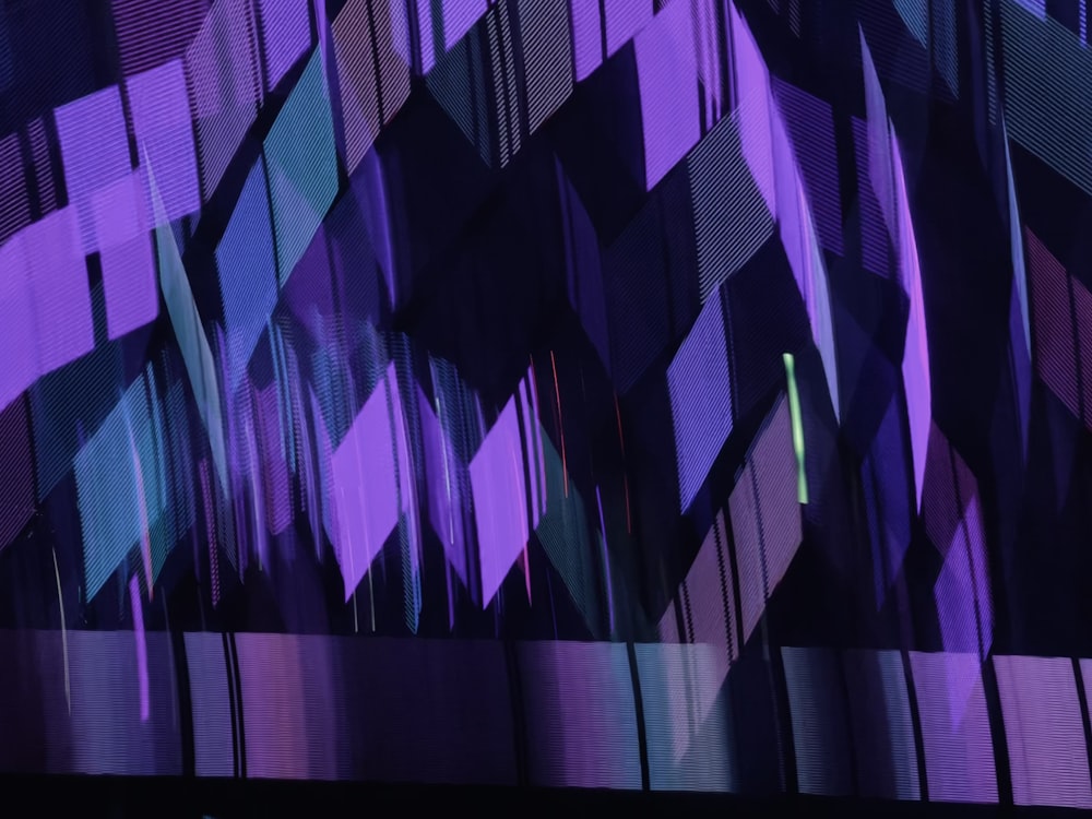 a close up of a purple curtain