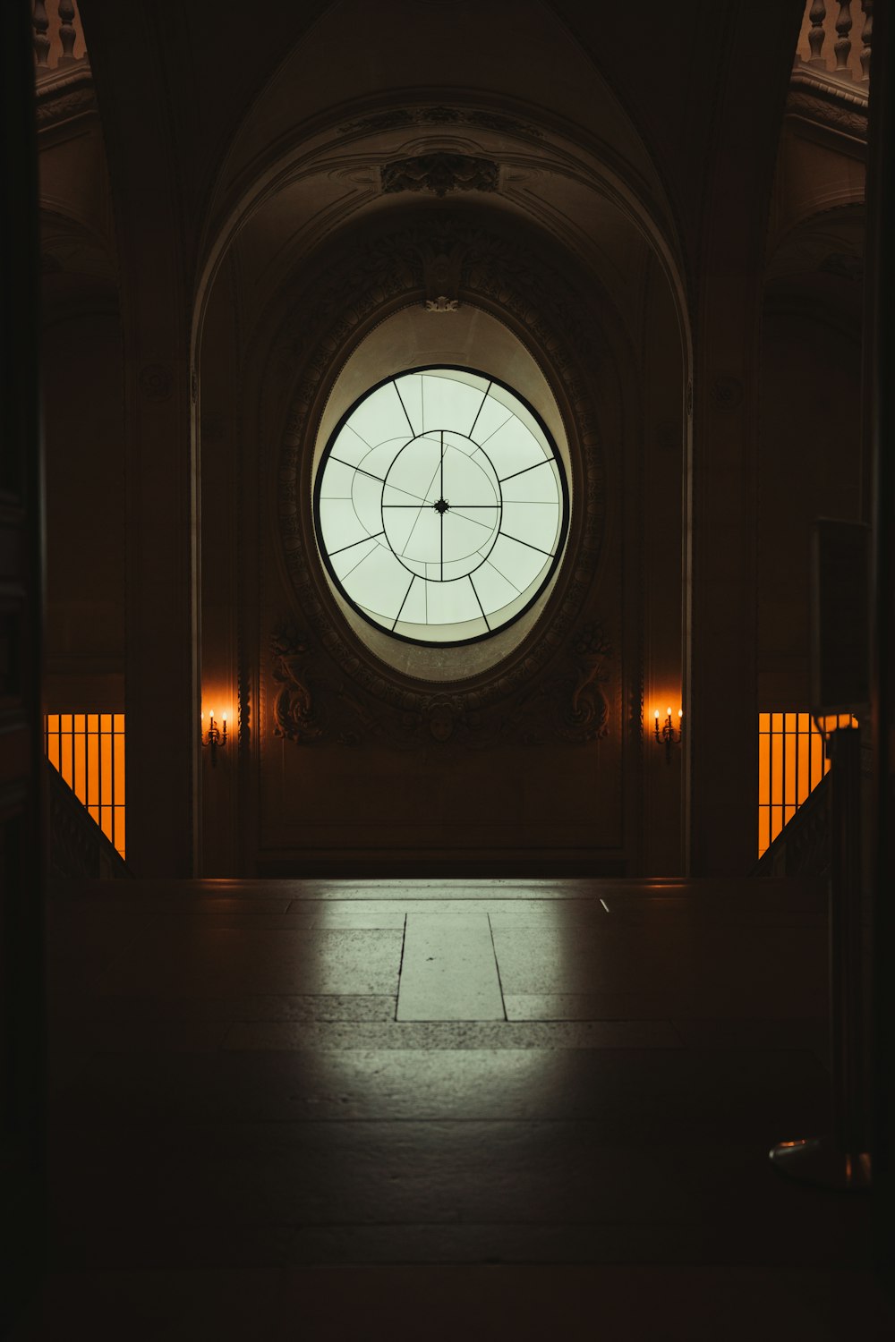 a large round window in the middle of a building