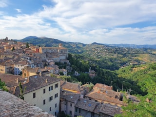 A beautiful Tuscan landscape showcasing traditional architecture.