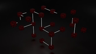 Clusters of interconnected cubes with a dark, web-like texture are set against a black background, with some cubes connected by thin white lines.