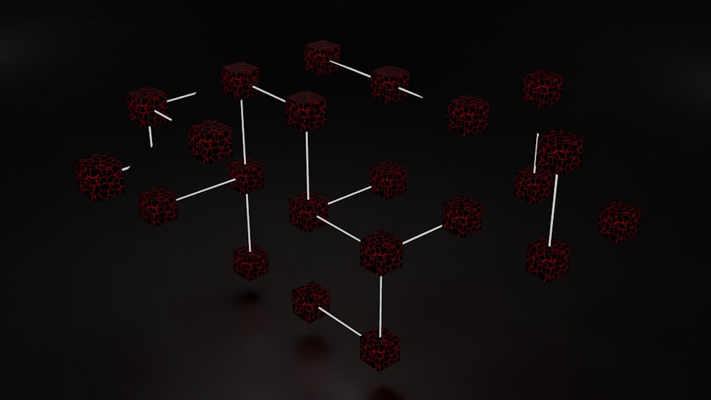 a group of red cubes with sticks sticking out of them