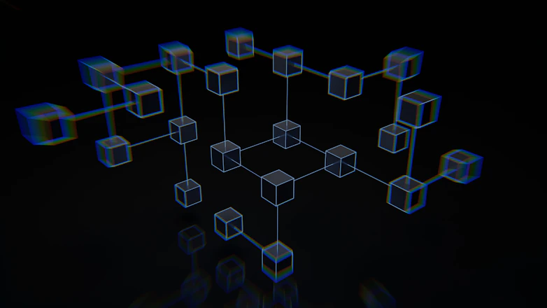 a group of cubes that are on a black surface