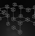 a black and white photo of a bunch of cubes