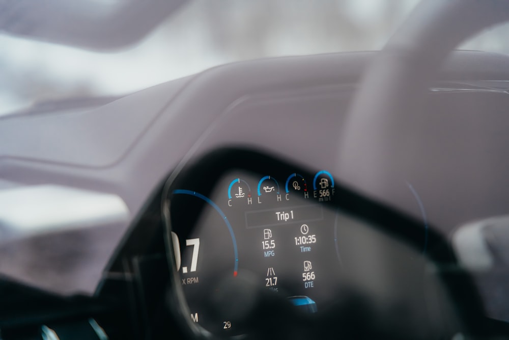 the dashboard of a car with a speedometer