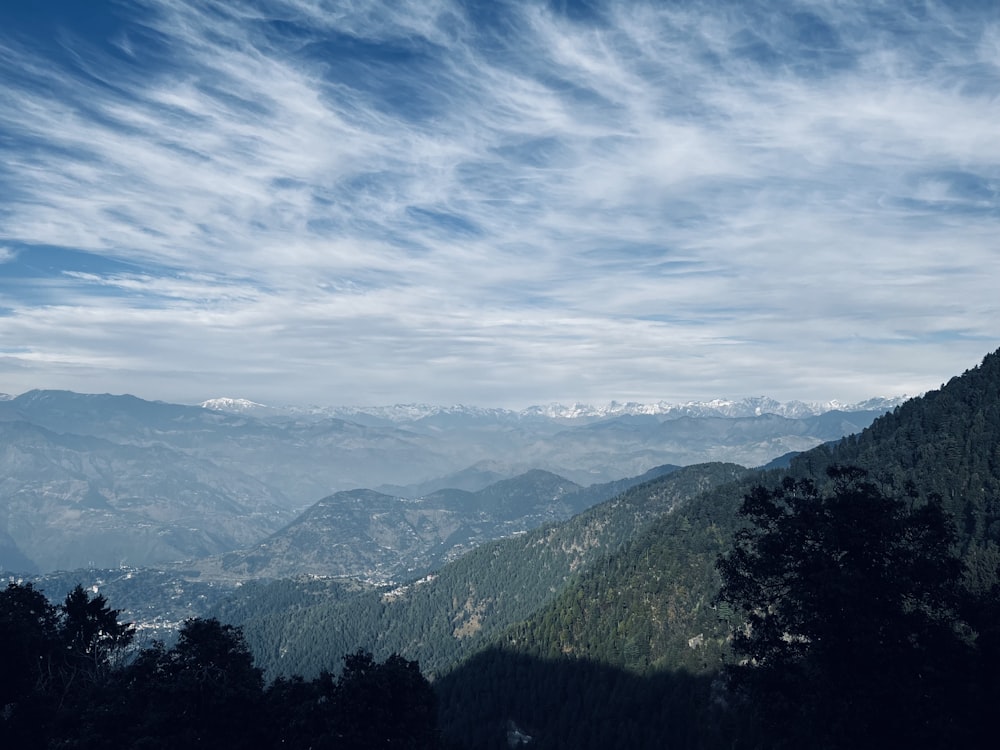 a view of a mountain range from a distance