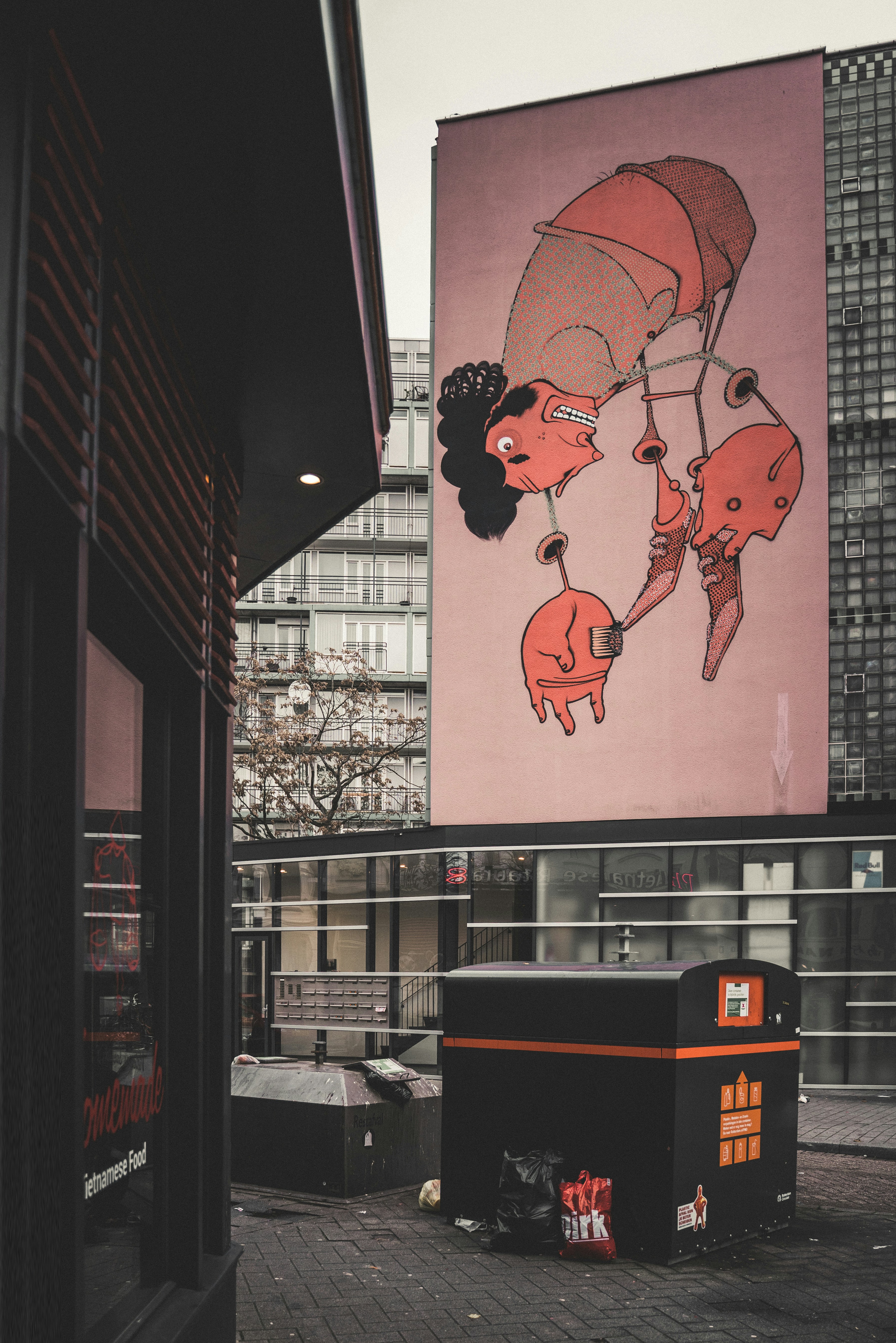 a large painting of a woman holding a baby