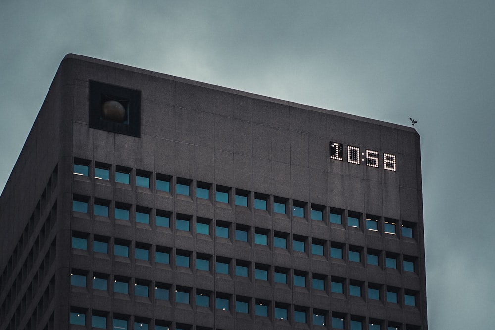 a tall building with a clock on the side of it