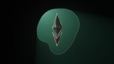 A stylized, geometric shape resembling the Ethereum logo is set against a dark green background. The shape is made of metallic, reflective surfaces with thin red outlines. It sits atop a larger, soft-edged shape in a lighter shade of green.