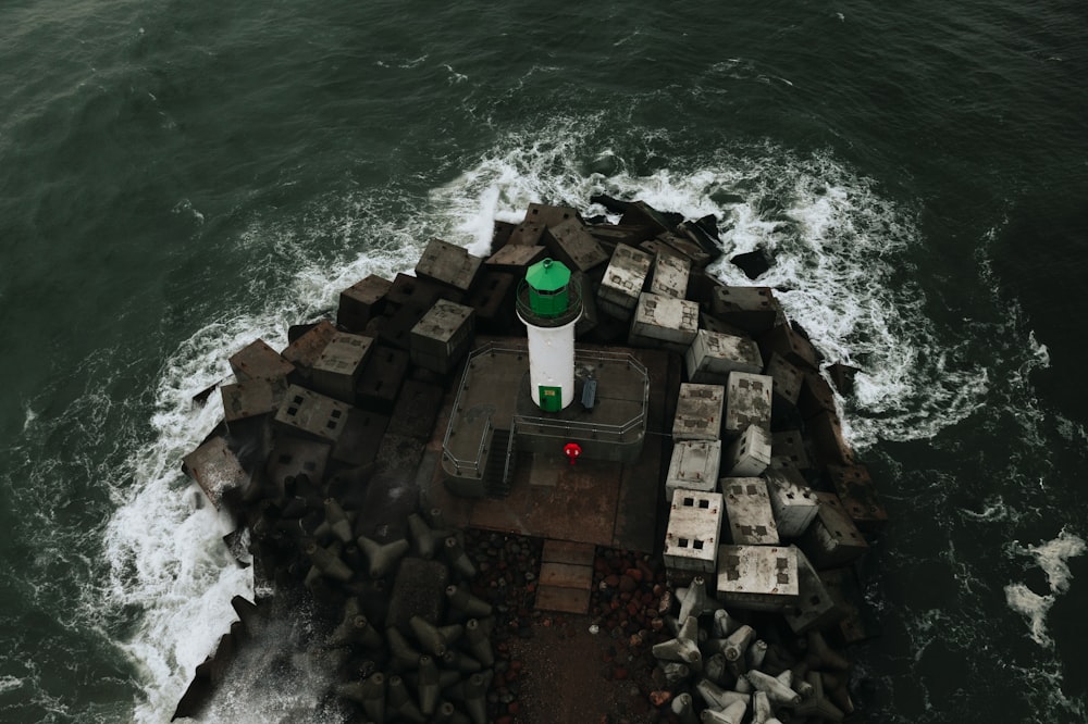 an aerial view of a boat in the ocean