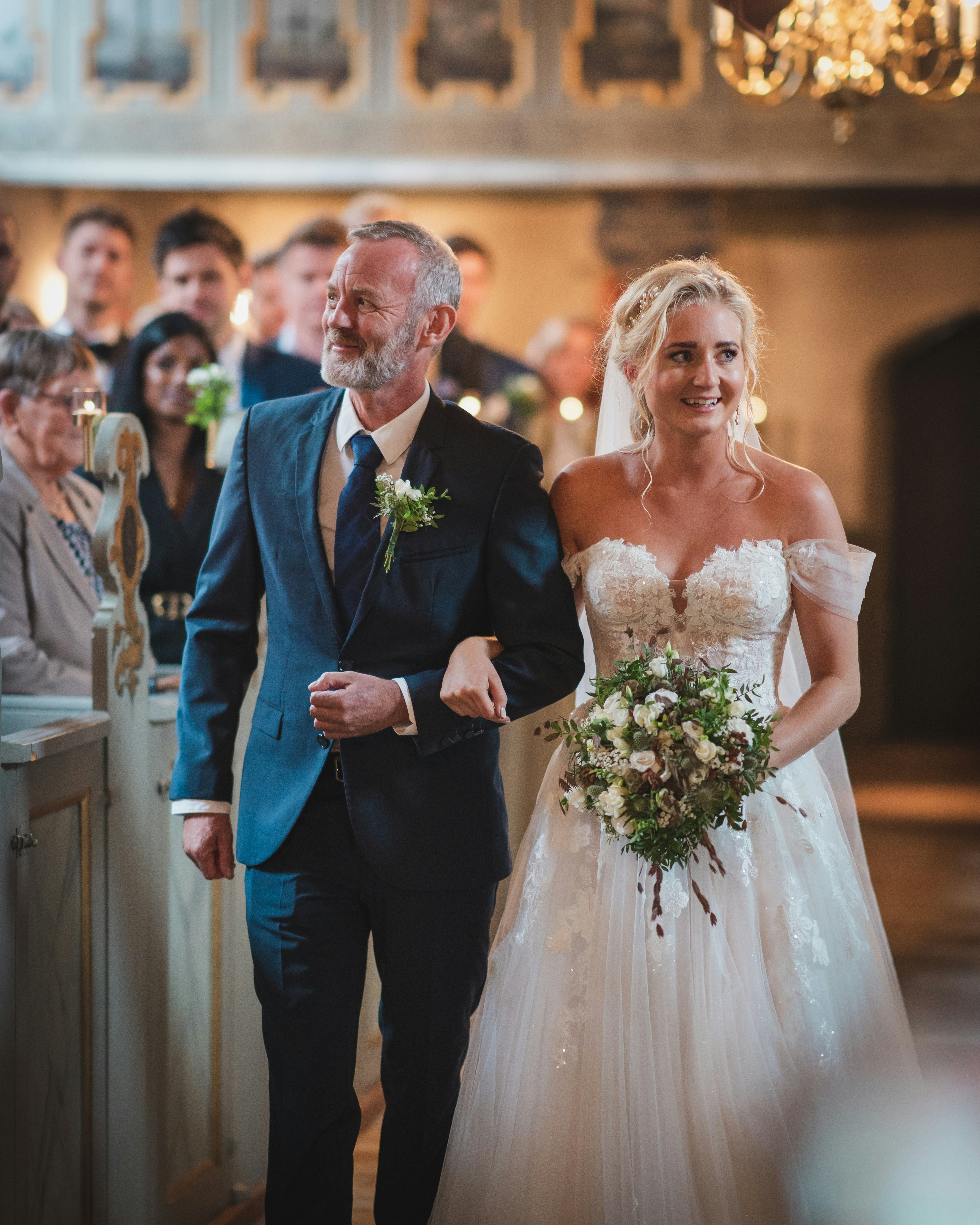 Bride walking down the aisle with her father