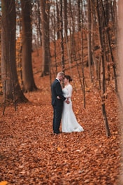Bride and groom in a Fife woodland—Central Scotland wedding videography moment in autumn.
