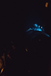 A sleek camera lens capturing a softly lit modern scene.