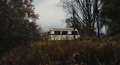 a bus that is sitting in the grass