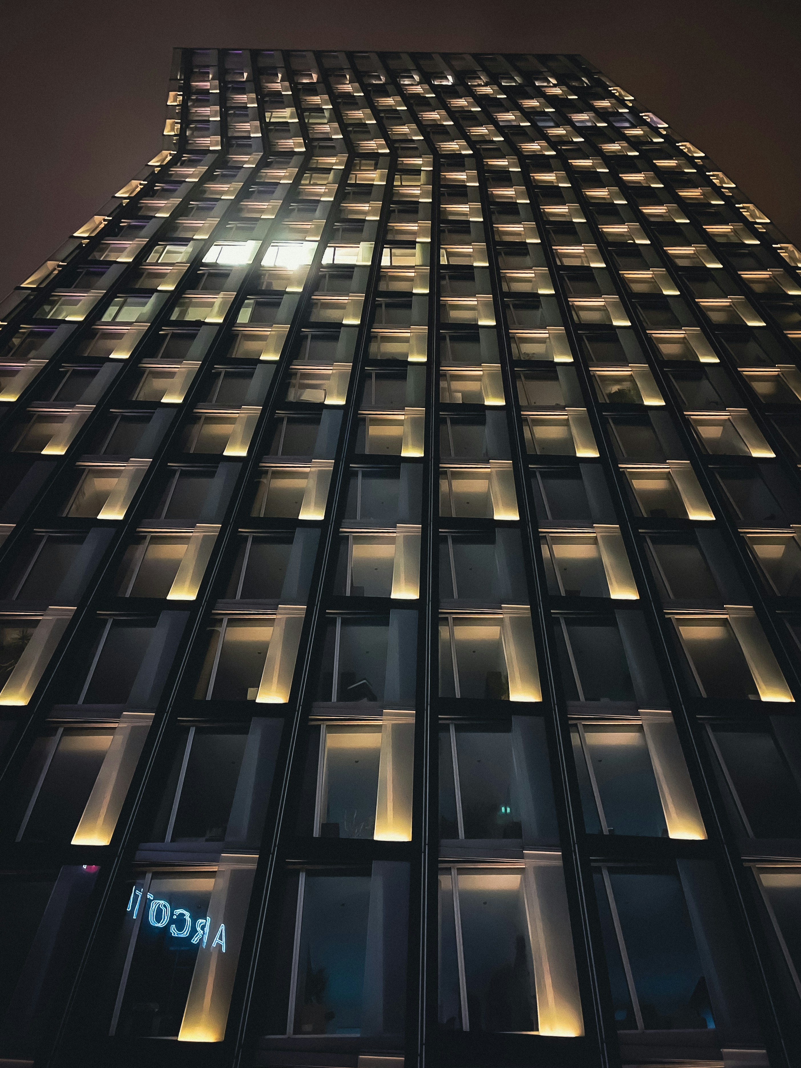 a very tall building lit up at night