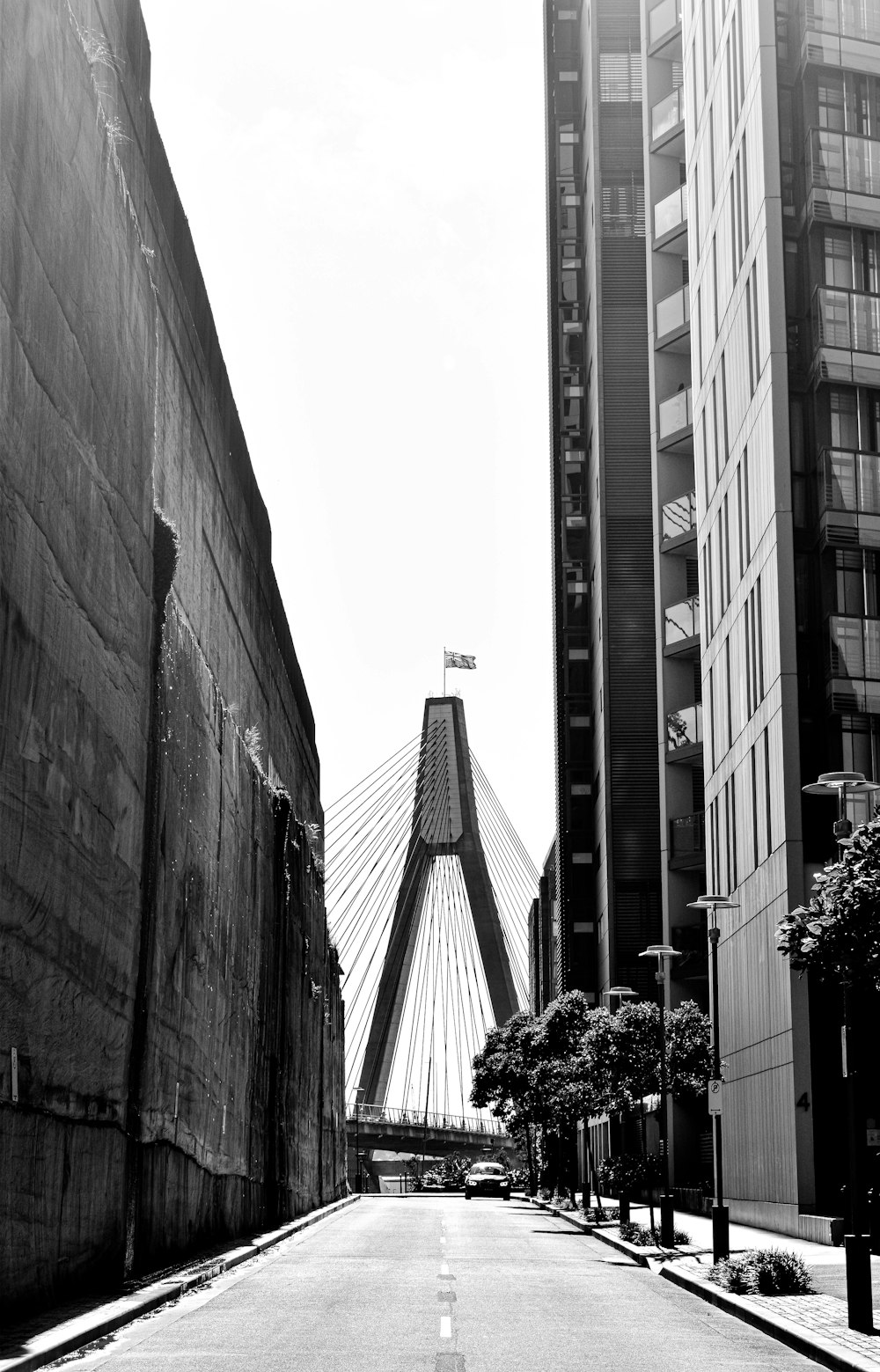 a black and white photo of a city street