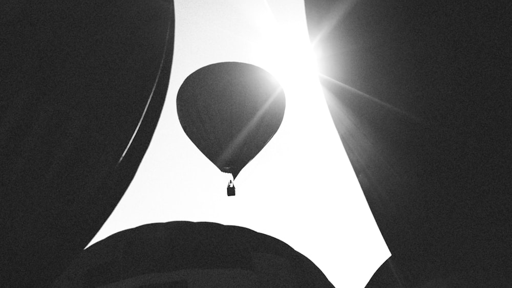 a black and white photo of a hot air balloon
