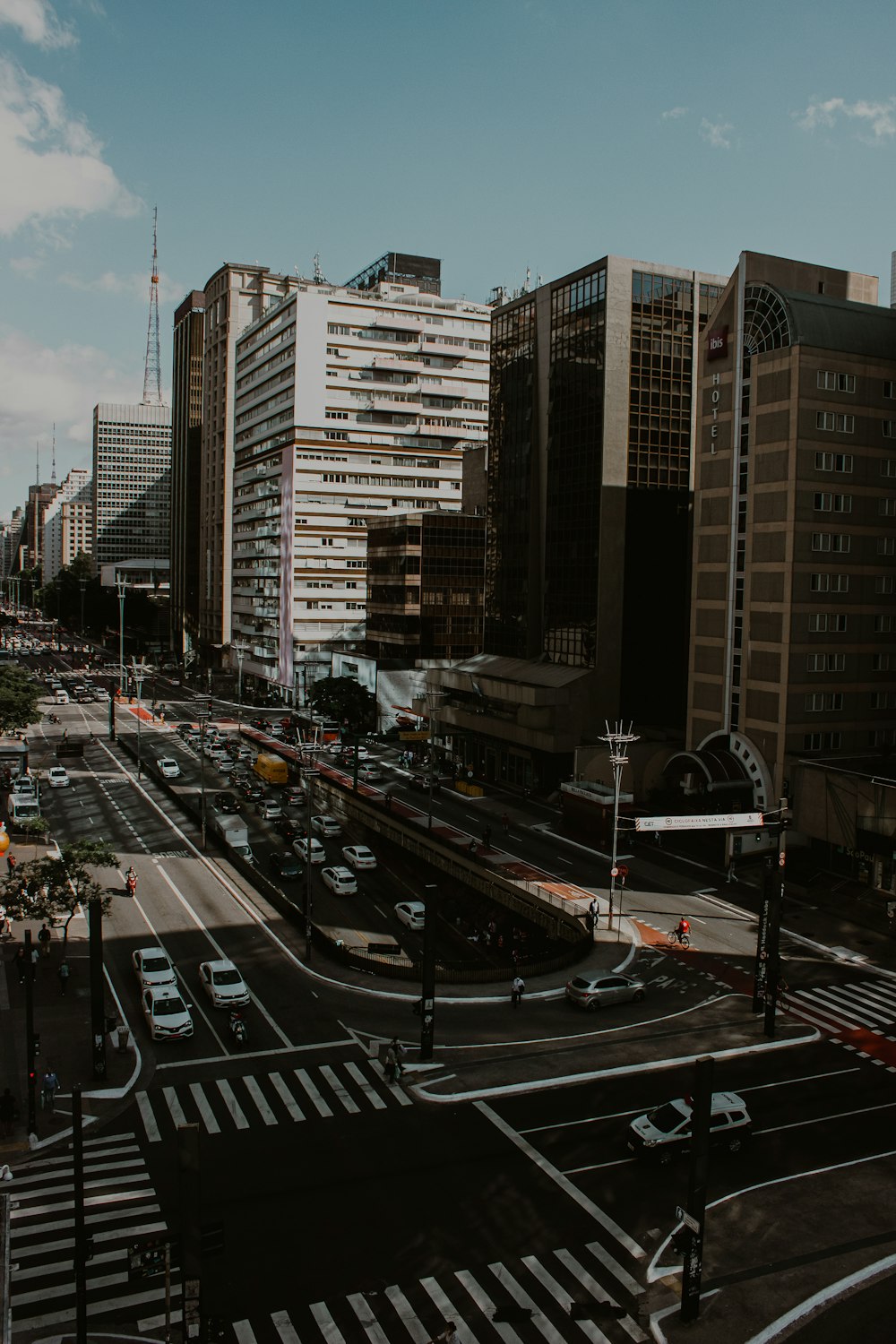 a city street filled with lots of traffic