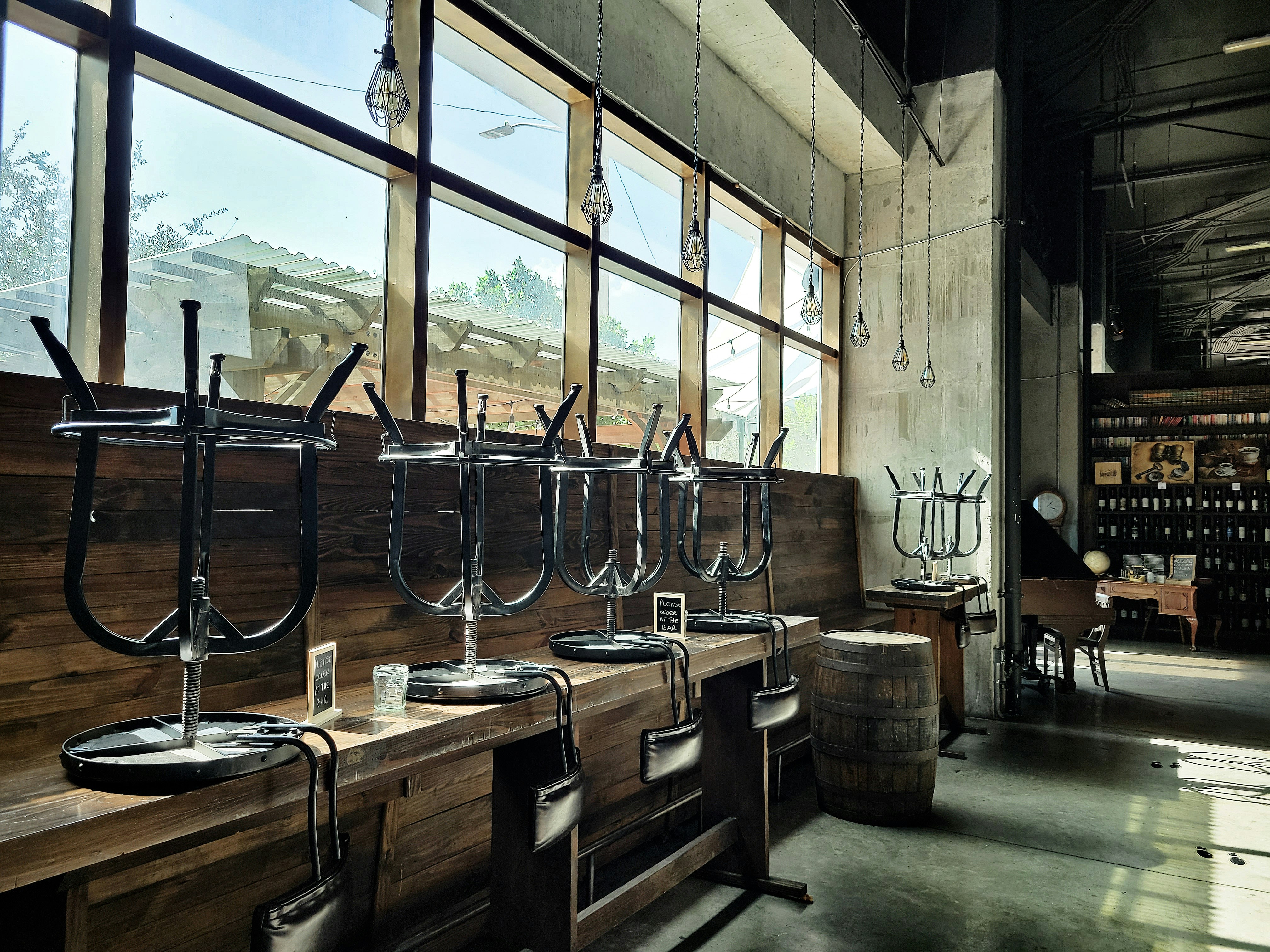 Wine glasses on a window bar counter
