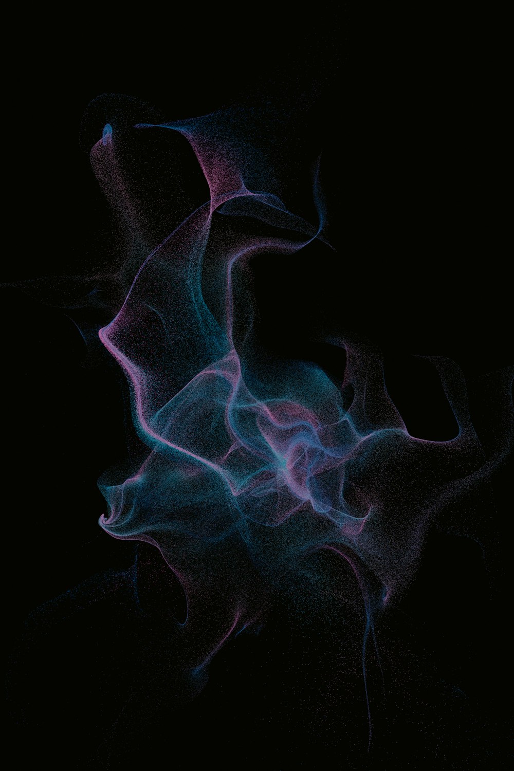 a black background with blue and pink smoke