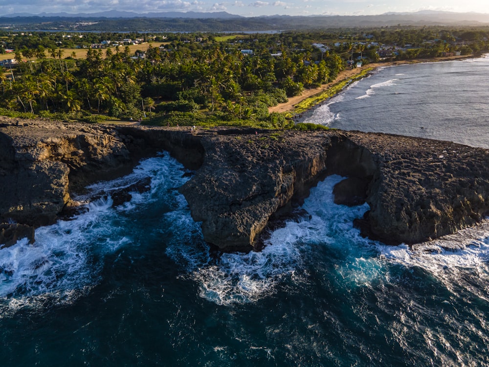 an aerial view of the ocean and coastline