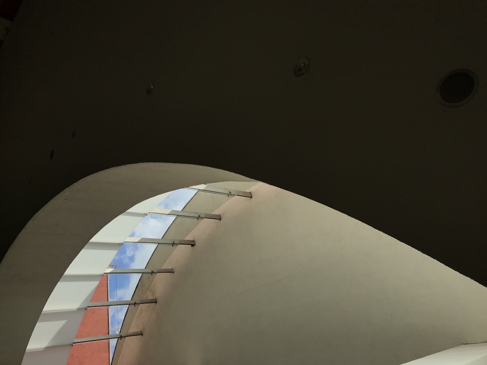 a view of the ceiling of a building through a window