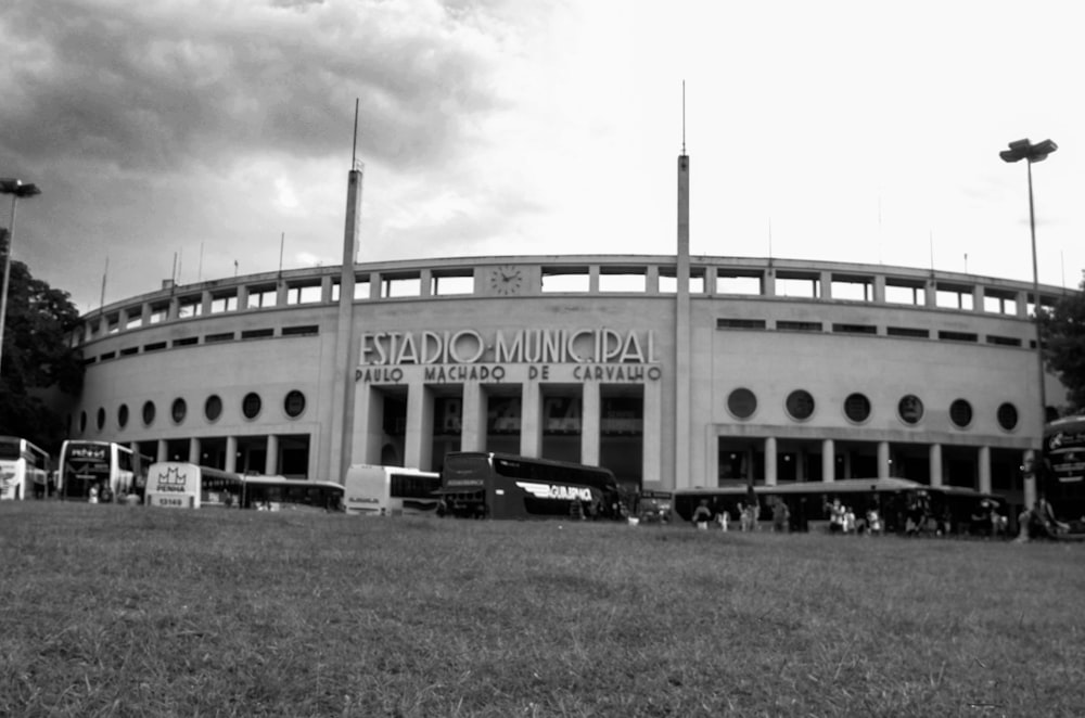 a black and white photo of a stadium