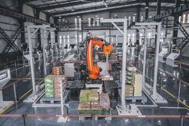 a factory with a robot in the middle of it