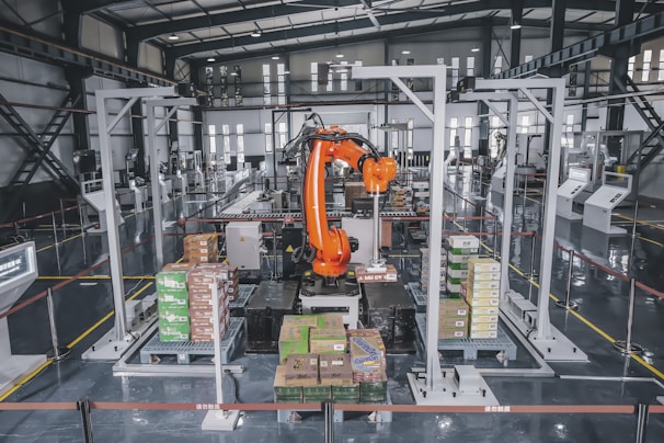 a factory with a robot in the middle of it