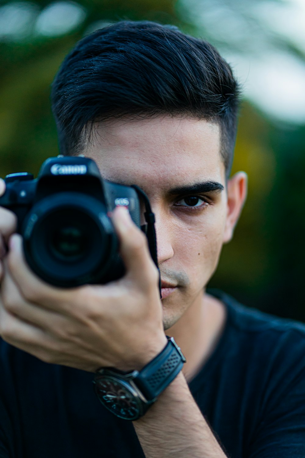 a man taking a picture with a camera