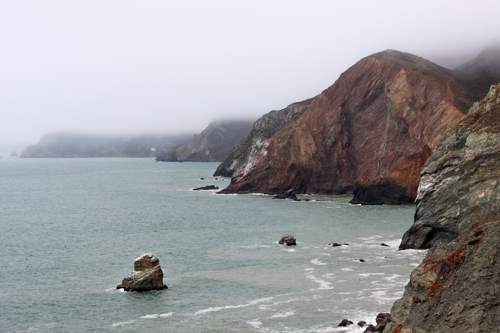 a large body of water surrounded by mountains