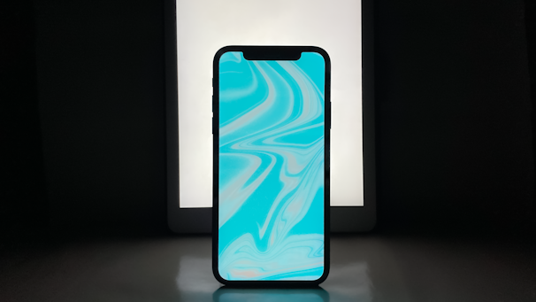 A sleek smartphone displaying the Wave Sync app interface with sound waves connecting multiple devices.