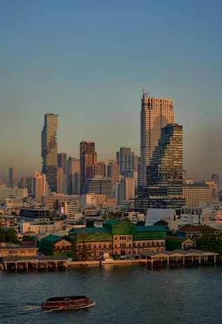 a large body of water with a city in the background