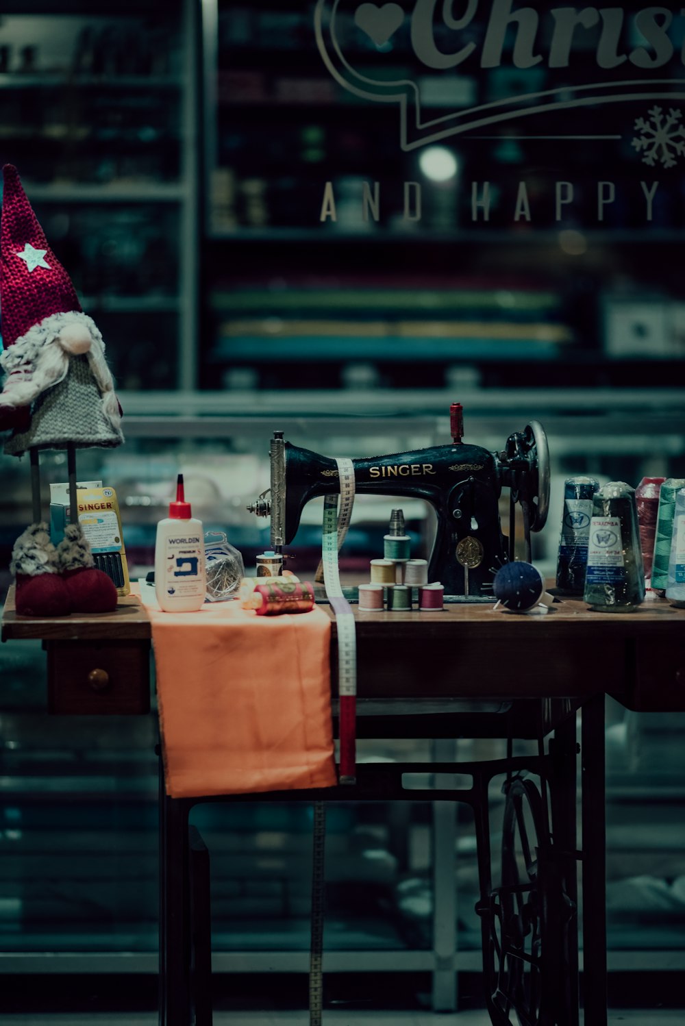 a sewing machine sitting on top of a wooden table