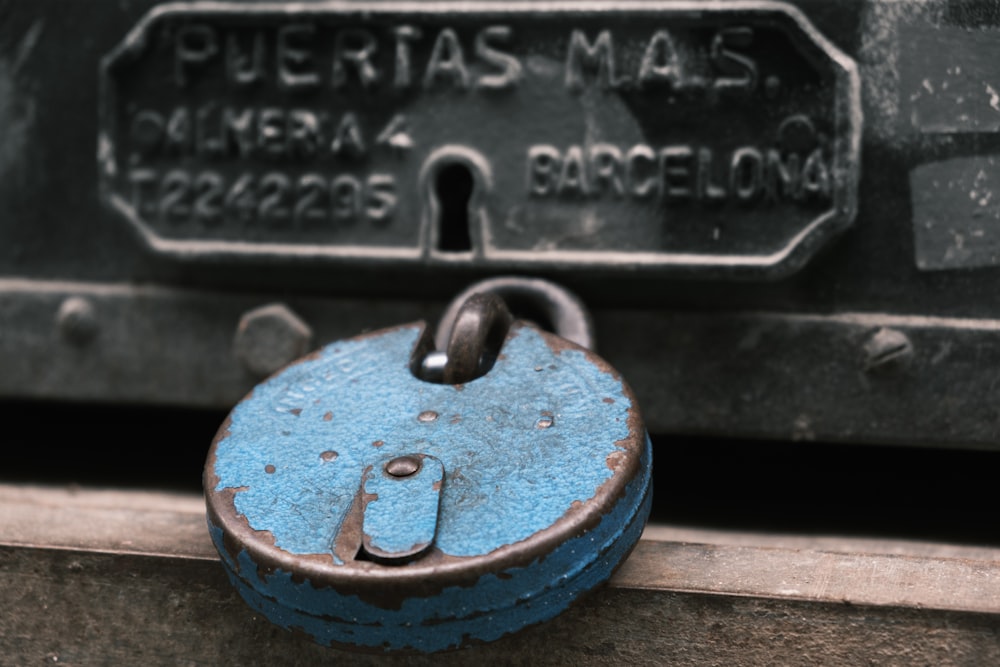 a close up of a padlock on a door