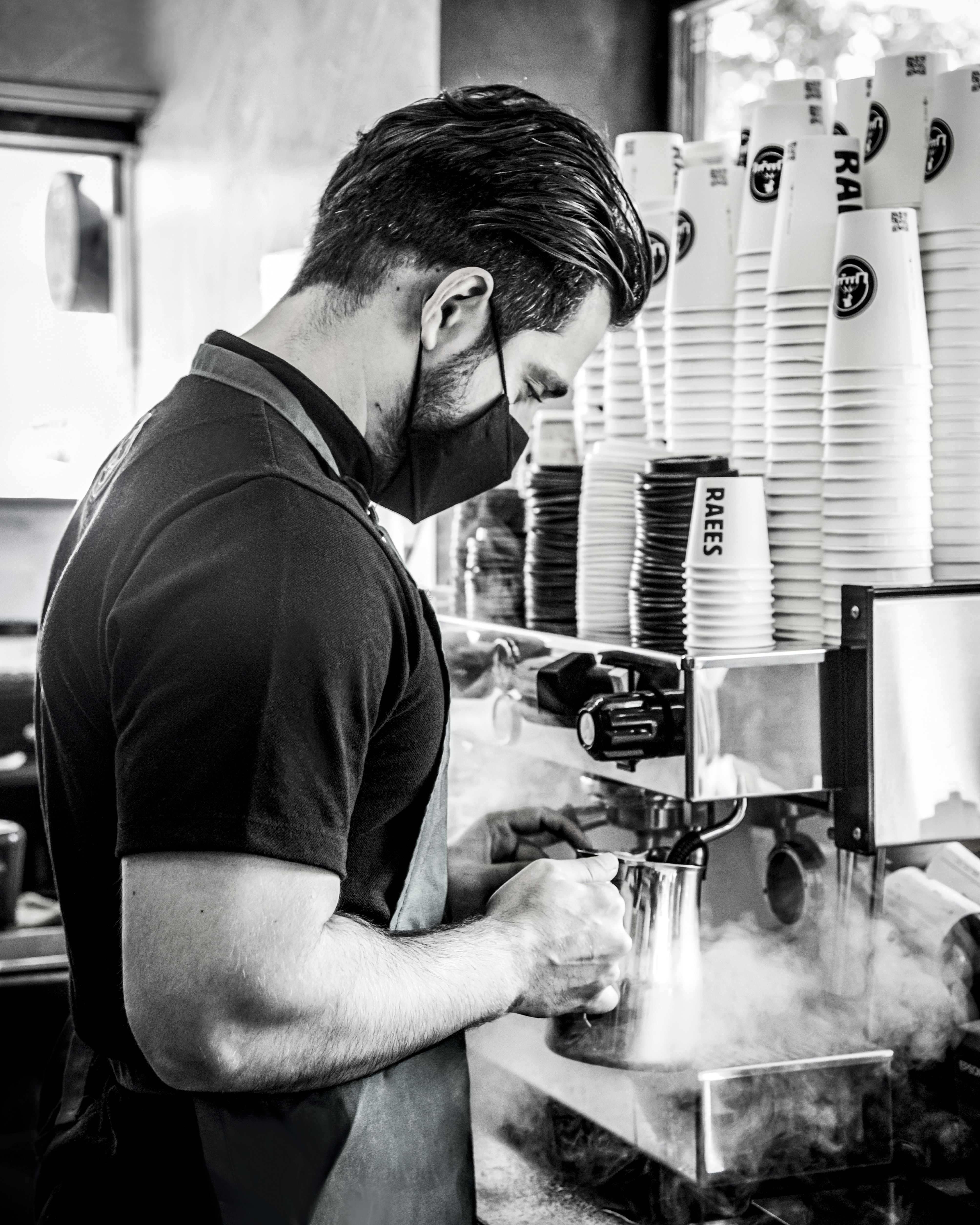 woman wearing yellow long-sleeved dress under white clouds and blue sky during daytime