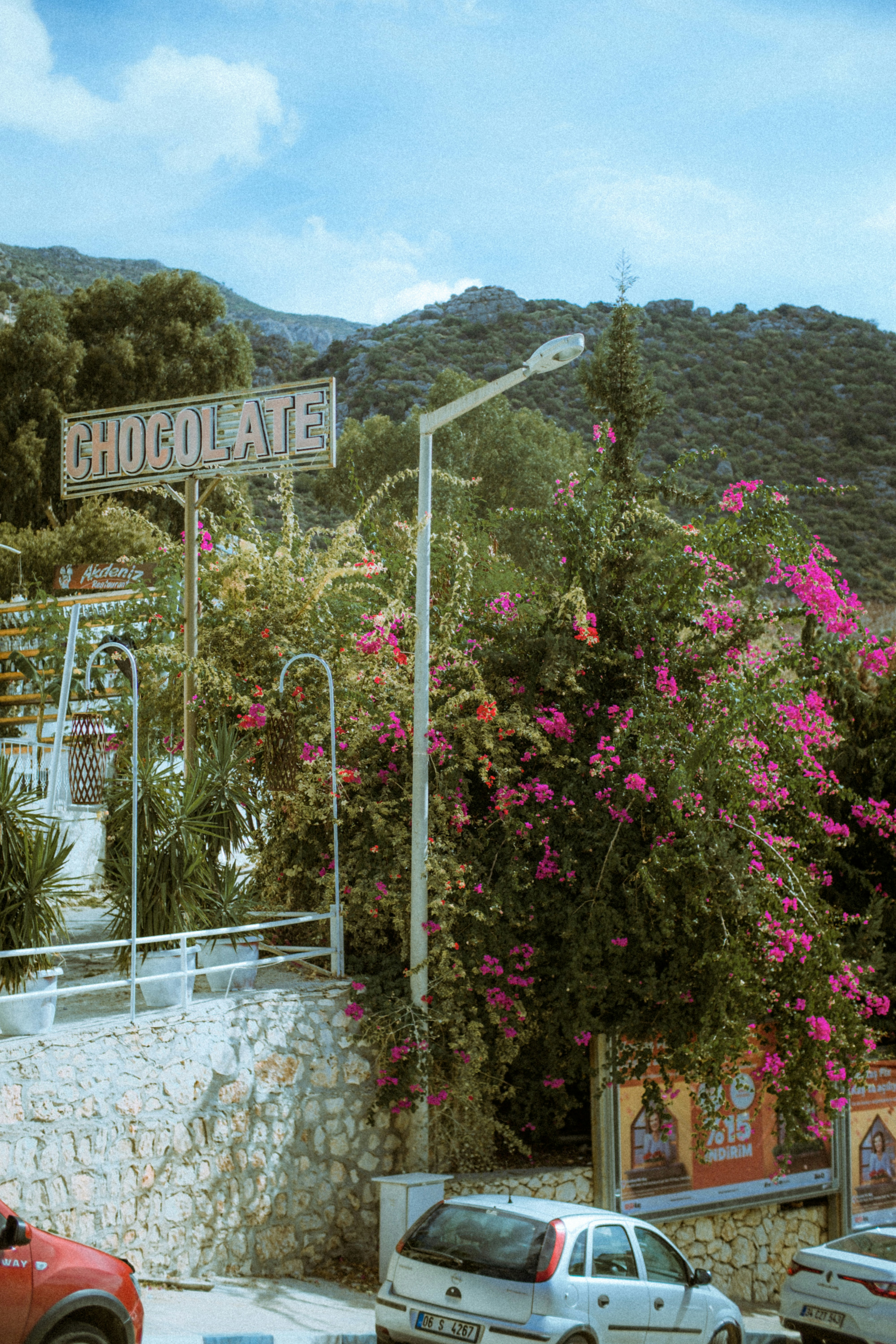 a street with cars parked on the side of it