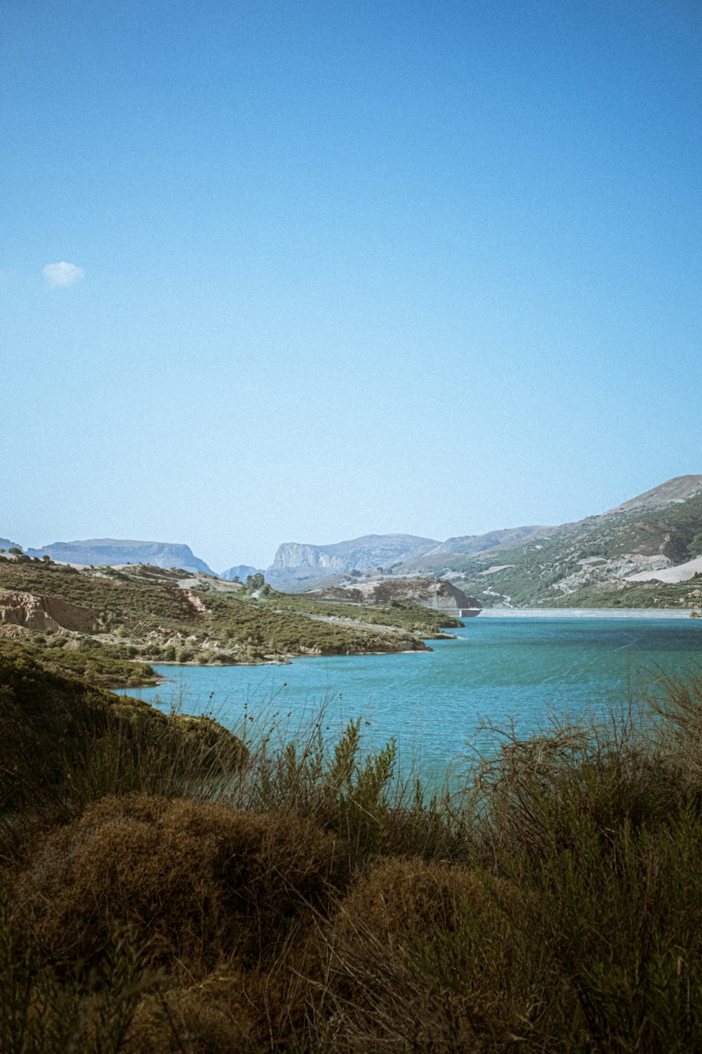 a large body of water surrounded by mountains