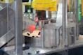 An industrial robot performing precision tasks on an assembly line.