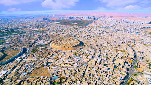 an aerial view of a city with lots of buildings