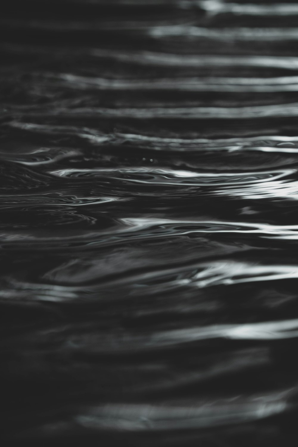 a black and white photo of water