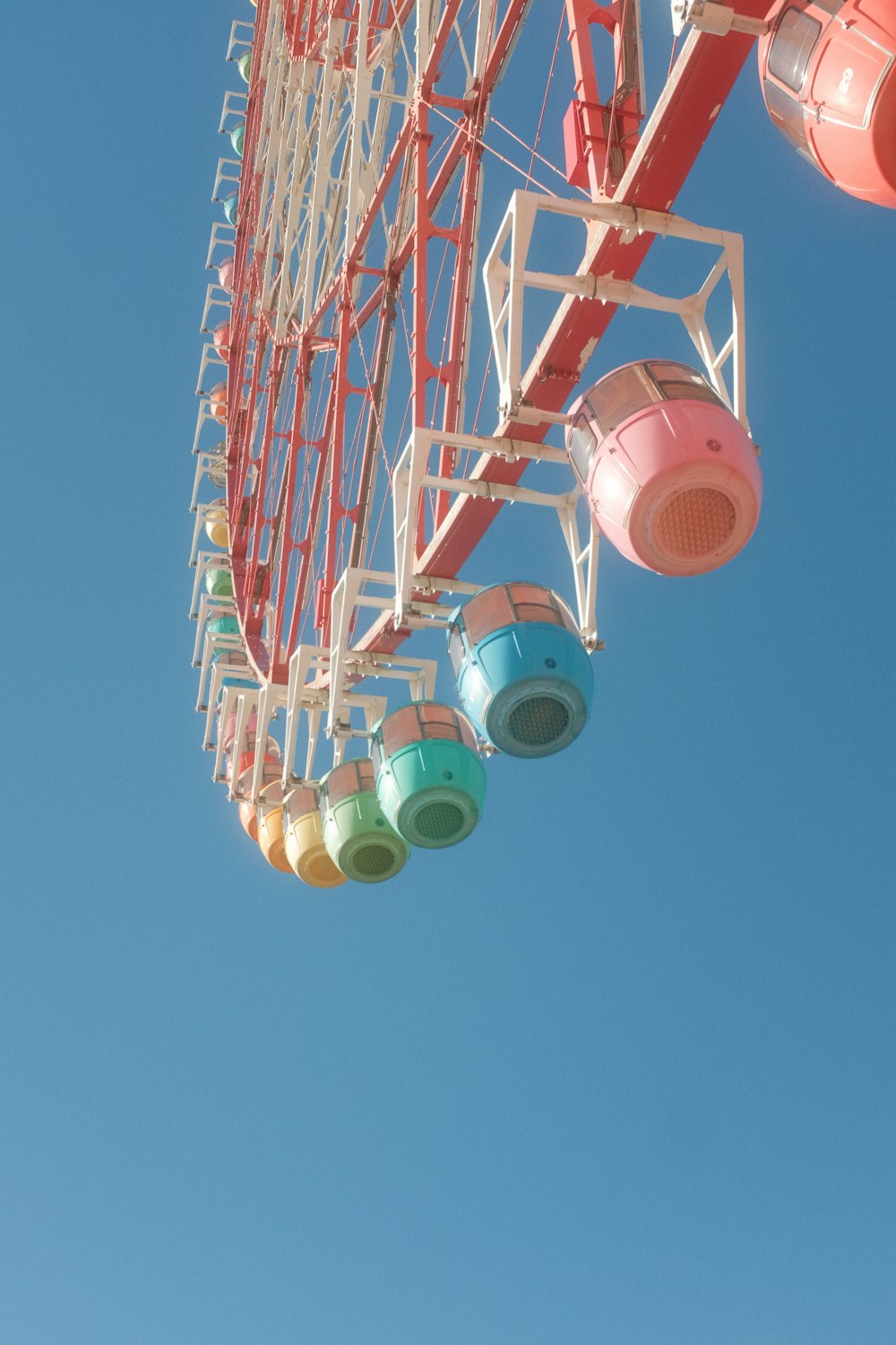 a ferris wheel with a blue sky in the background