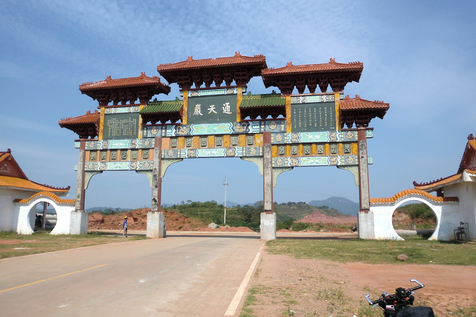 a motorcycle parked in front of a gate